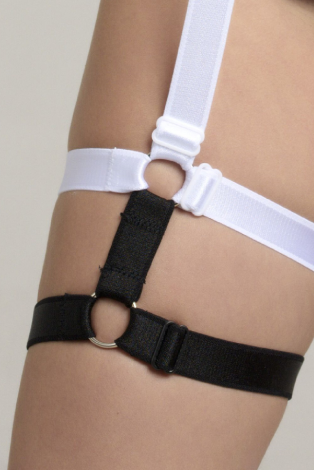 Elastic thigh straps detail on harness pole dance top, checker and zebra pattern options, secure fit by Caro Line