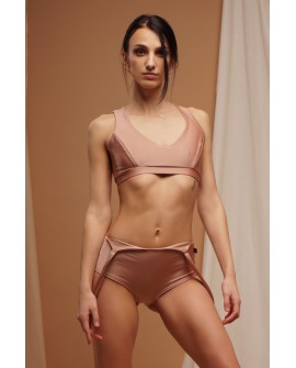 Suspenders pole dance shorts in cappuccino with elastic straps worn in multiple ways, front view