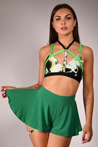 Witch pole dance top in juicy green, styled with boho shorts, colorful strap patterned dance top outfit