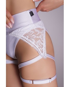 Detail of lace panel and adjustable thigh strap on soft pole dance shorts in white