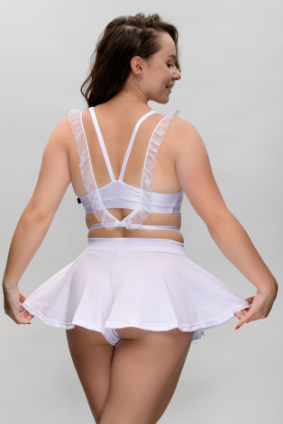 Boho shorts in white – back view highlighting soft drape and movement