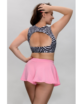 Boho shorts in light pink – back view highlighting soft drape and movement