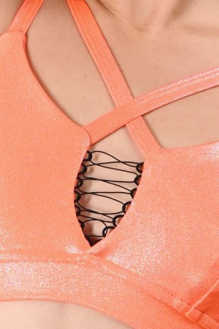 Future Top detail in orange– glossy fabric and decorative tie on the bust