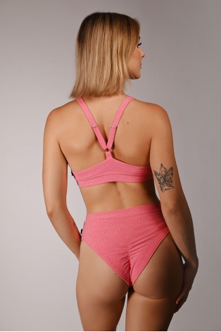 Back view of Glittery Spooky Shorts in light coral showing brazilian cut