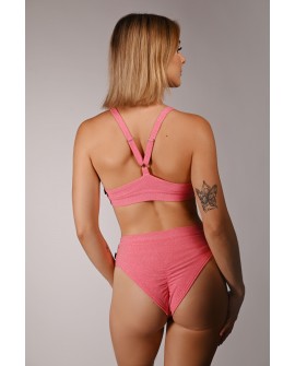 Back view of Glittery Spooky Shorts in light coral showing brazilian cut