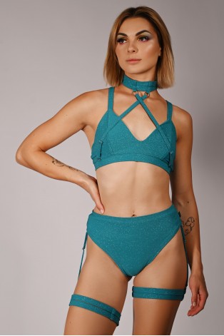 Side view of Glittery Spooky Top in turquoise, highlighting glitter fabric