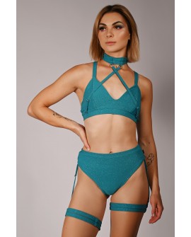 Side view of Glittery Spooky Top in turquoise, highlighting glitter fabric