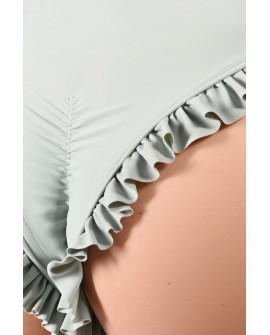 Detail of decorative flounces on lily water lily inspired dance shorts in sage green
