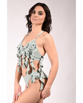 Lily exotic pole top in sage green with flowing flounces over the stomach, side view