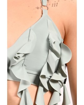 Detail of cascading flounces on lily water lily inspired dance top in sage green