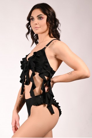Lily exotic pole top in black with flowing flounces over the stomach, side view