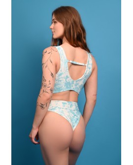 Poetry Bodysuit featuring a Victorian-inspired blue rose print, adjustable back strap and Brazilian cut, rear three-quarter view