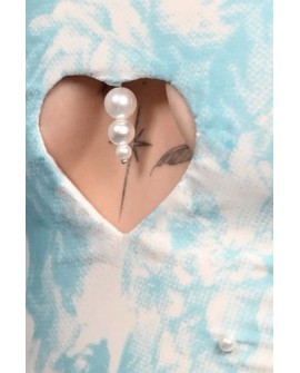 Close-up of Victorian Corset Top showing pearl embellishments, heart-shaped cut-out detail