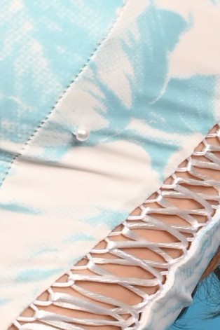 Close-up of Victorian Corset Top showing pearl embellishments, lacing detail