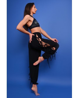 Crystal dance pants with dramatic side openings and multiple adjustable ties, in navy blue, side view