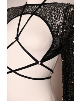 Witch Top in black, close-up of sparkling sequins, sheer mesh and decorative front tie straps