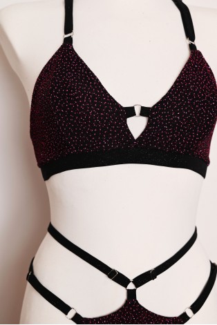 Starlight Set black pole dance top close-up showing purple sequins, burgundy shimmer and adjustable shoulder straps