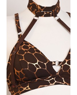 Giraffe Set top close-up showing the gold giraffe-inspired pattern, front ring detail and adjustable straps