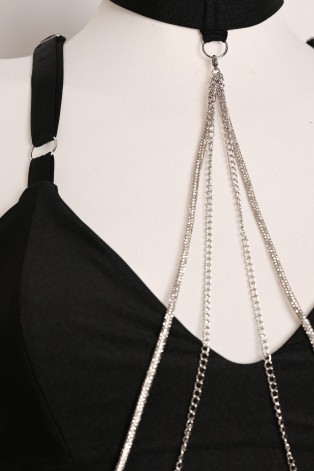 Chain Set close-up of detachable silver chains decorating the neckline of the black pole dance top