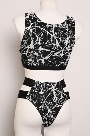 Splash Set black and white abstract pole dance outfit showing the covered back of the top and matching shorts, back view