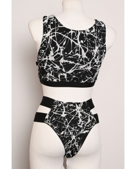 Splash Set black and white abstract pole dance outfit showing the covered back of the top and matching shorts, back view