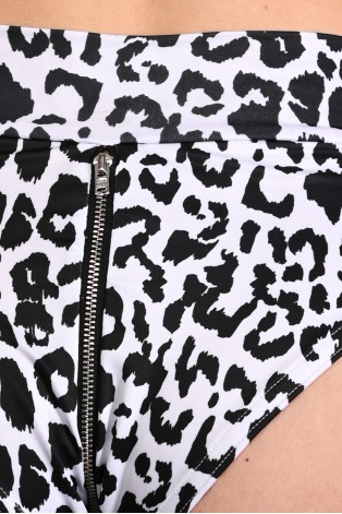 Close-up of the decorative silver zipper on the back of the Leopard Zip Set black and white leopard print shorts