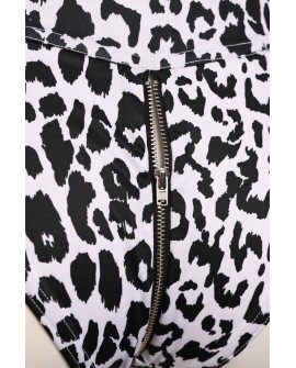 Close-up of the silver metal zipper detail on the back of the Leopard Zip Set animal print shorts
