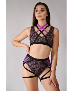 Wild Set animal print pole dance top and shorts with purple and black harness straps, front view
