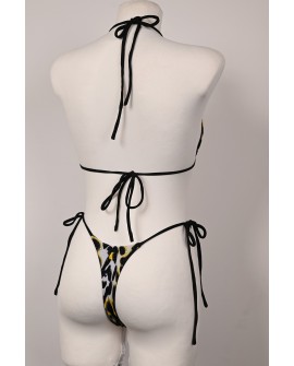 Back view of Caro Line Banana Bikini with adjustable black tie straps and leopard print bottoms