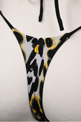 Banana Bikini back detail featuring a black bow and decorative yellow banana charm