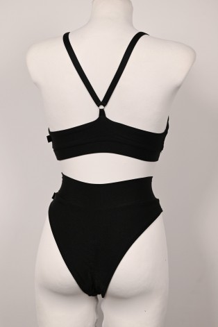 Back view of Silver Rush black dancewear set with high-waisted shorts and sequin trim