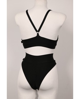 Back view of Silver Rush black dancewear set with high-waisted shorts and sequin trim
